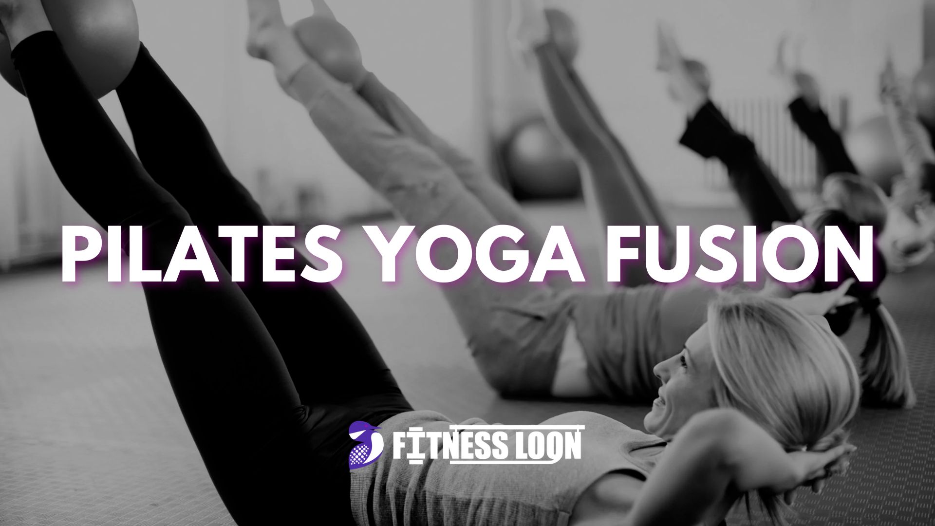 Pilates yoga fusion class doing leg raises